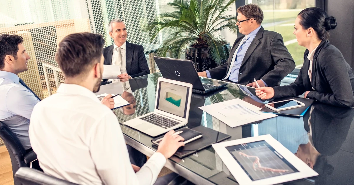 SEO consultants at an agency holding a meeting.