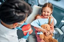 a girl at dentist's chamber in Easley