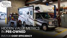 A Class C Motorhome Parked Inside an RV Repair Shop