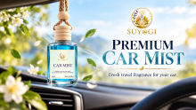 Suyogi Premium Car Mist hanging fragrance bottle inside a car