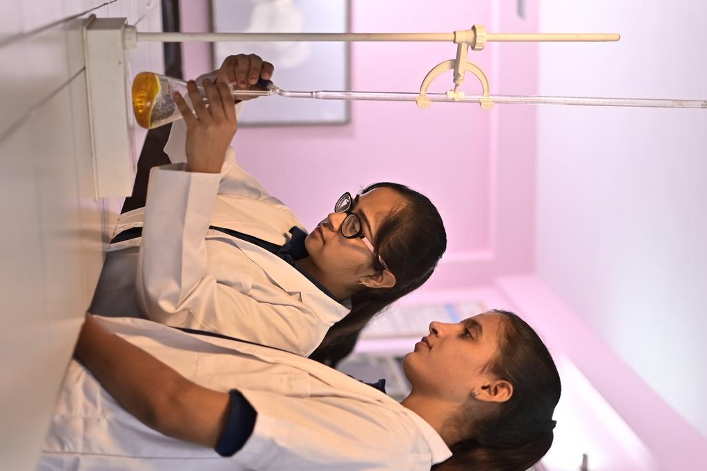   Precaution in Chemistry laboratory of Poddar International College Jaipur